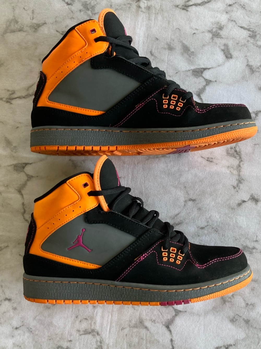 Jordans Black & Orange High-Top Sneakers 7Y pink logo